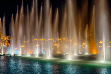 Singing and Dancing Fountains in Republic Square in Yerevan. Night city lights show.