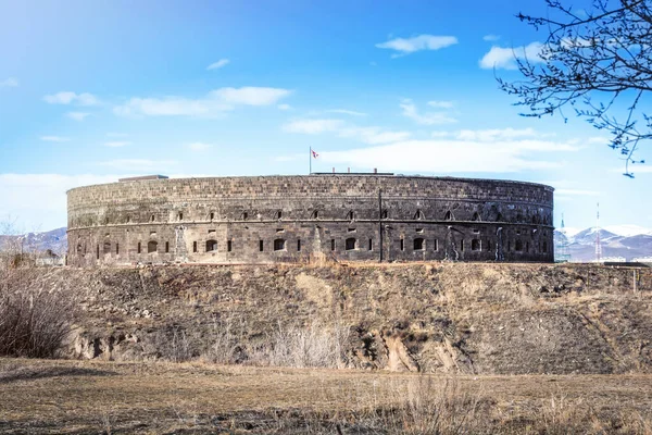 Ancient russian fortress in Gyumri city. Armenia and Armenian flag on the roof