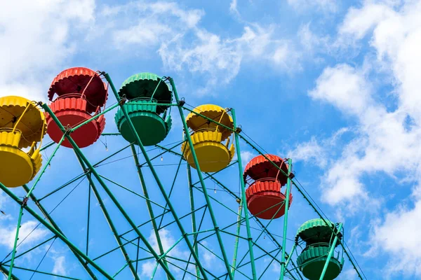 Ferris Wheel Over Blue Sky . Big wheel