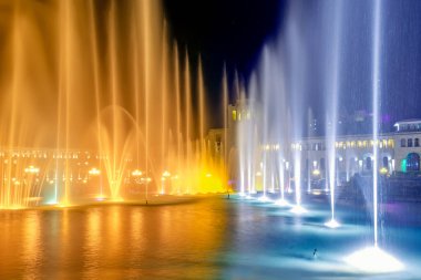 Singing and Dancing Fountains in Republic Square in Yerevan. Night city lights show.