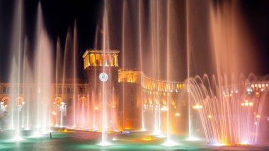 Singing and Dancing Fountains in Republic Square in Yerevan. Night city lights show.