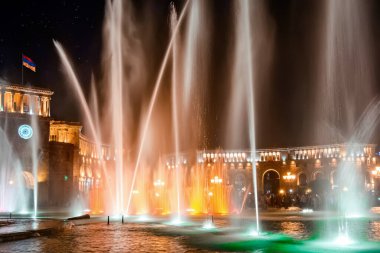 Singing and Dancing Fountains in Republic Square in Yerevan. Night city lights show.