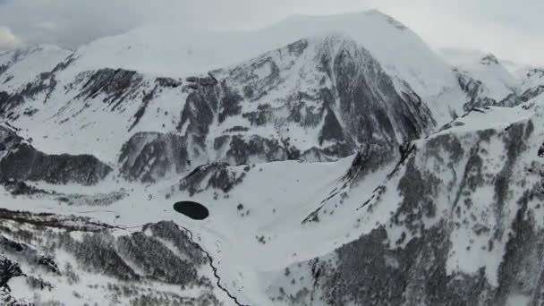 Aerial view of beautiful snowy mountains in Gudauri, Georgia — Stockvideo