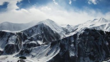 Aerial view of beautiful snowy mountains in Gudauri, Georgia