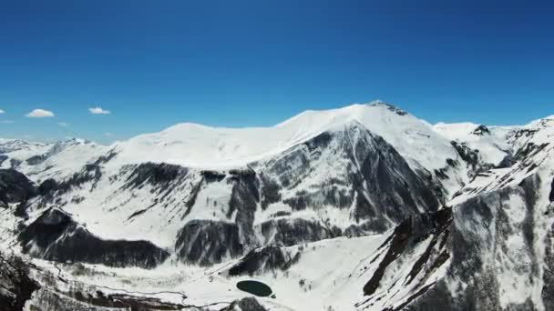 Aerial view of beautiful snowy mountains in Gudauri, Georgia — Stockvideo