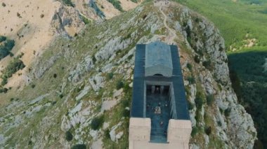 Montenegro. Lovcen National Park. Drone. Aerial view. Viewpoint. Popular tourist attraction. Flight over Negosh Mausoleum on Mount Lovcen. The camera moves from left to right