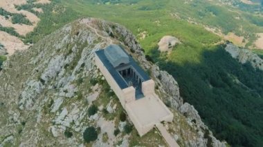 Montenegro. Lovcen National Park. Drone. Aerial view. Viewpoint. Popular tourist attraction. Flight over Negosh Mausoleum on Mount Lovcen. The camera is spinning