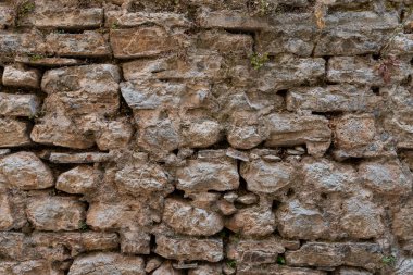 Old stone wall. Vintage stonework background