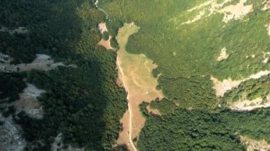 Montenegro. Prokletiye National Park. Summer. Mountain green valley. Popular tourist spot. Drone. Aerial view. The camera moves forward