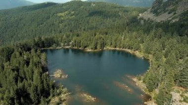 Montenegro. Prokletiye National Park. Mountain lake. Popular tourist spot. Drone. The camera moves backward