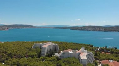 Croatia. Bay on the coast of the Adriatic Sea. Summer. Tourist season. Popular place to relaxation. Drone. Aerial view. The camera moves forward