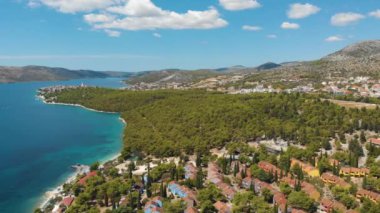 Croatia. Bay on the coast of the Adriatic Sea. Summer. Tourist season. Popular place to relaxation. Drone. Aerial view. The camera moves from left to right