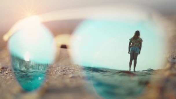 Girl Stands Empty Sandy Beach Sunrise Sunset View Reflection Sunglasses — Stock Video