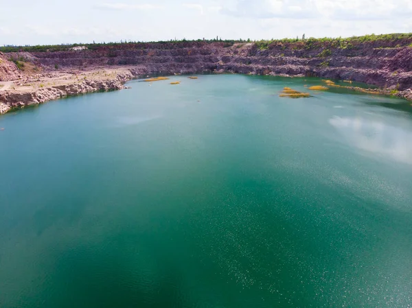 Ukraine. Flooded granite quarry. Drone. Aerial view