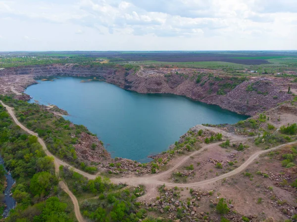 Ukraine. Flooded granite quarry. Drone. Aerial view