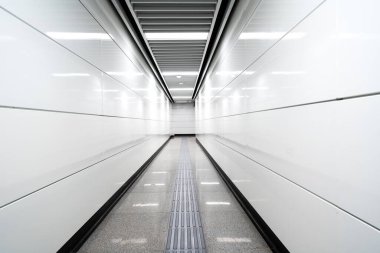 Modern underground pedestrian passageway with artistic lines