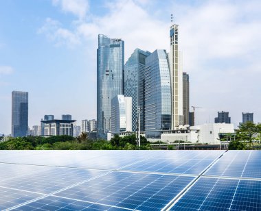 Photovoltaic panels in front of city background clipart