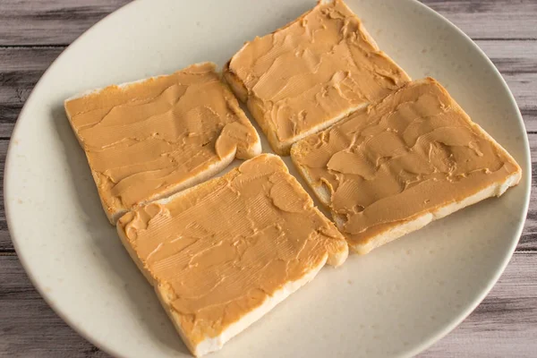 Toast Peanut Paste Plate — Stock Photo, Image