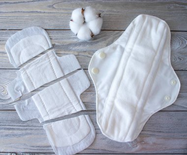 Tekrar kullanılabilir pedlerin ve kesilebilir pedlerin karşılaştırılması. Yeniden kullanılabilir konsept