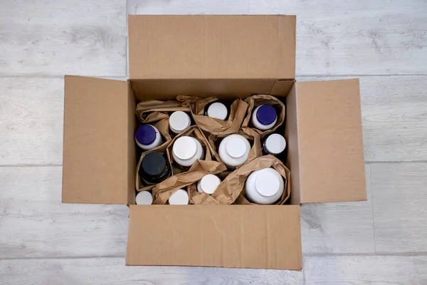Full Cardboard Box Jars Vitamins Dietary Supplements —  Fotos de Stock