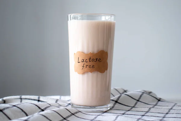 Glass Almond Milk Labeled Lactose Free — Stok fotoğraf