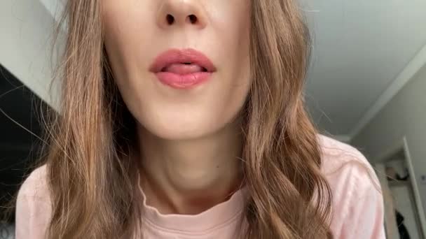 Young Woman Shows Her Tongue Rolled Tube — Video Stock