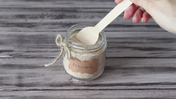 Psillio Guscio Una Piantaggine Vaso Con Cucchiaio Adesivo Con Parola — Video Stock