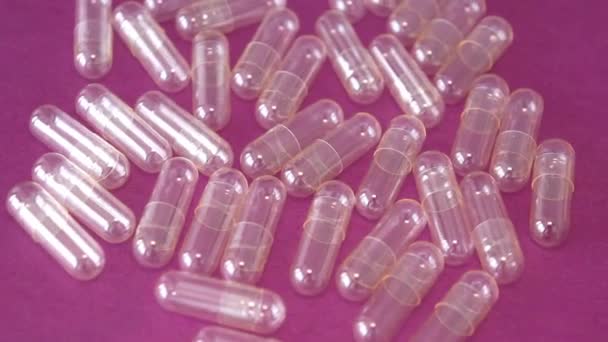 Empty Capsules Pink Background — Αρχείο Βίντεο