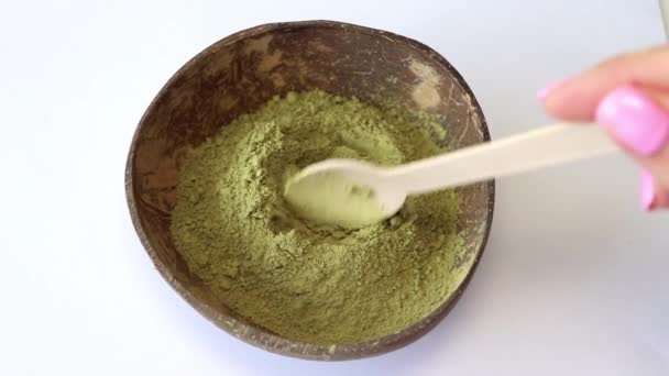 Woman Scoops Matcha Green Tea Powder Wooden Spoon White Background — 图库视频影像