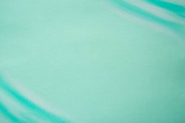 Beautiful abstract grunge decorative light turquoise painted wall with gradient texture. Handmade layout. Wide background with copy space