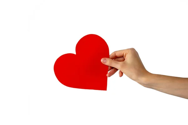 Mão Das Mulheres Segura Papel Vermelho Coração Fundo Branco Isolado — Fotografia de Stock