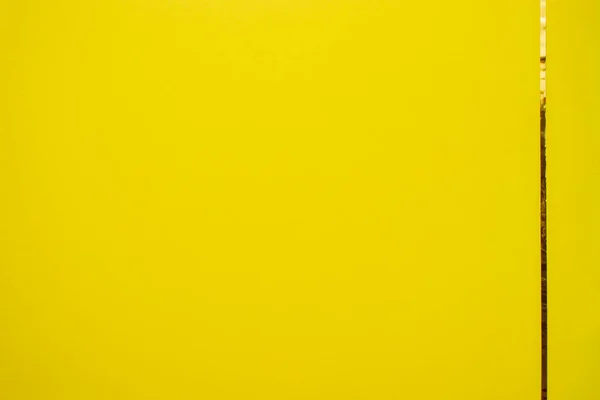 Żółte Słońce Kolor Tło Teksturą Papieru Złotą Wstążką Nadaje Się — Zdjęcie stockowe