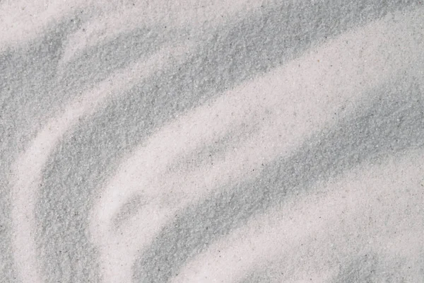 Arkaplan için kumsalda çizgili gri eğri efektinin soyut yüzey duvar kağıdı.