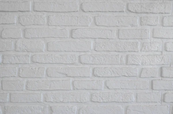 Abstract modern brick block concrete wall texture for the backdrop. White pattern background with copy space for text design.