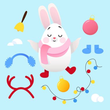 Bir dizi Noel süslemesi olan sevimli beyaz tavşan.