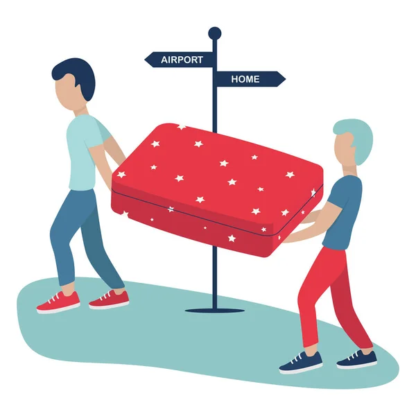 Two young men carrying heavy suitcase