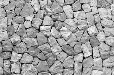 Soyut gri doku arkaplanı. Sıra dışı bir deseni olan taş zemin fayansları. Süslü desenli taş duvar