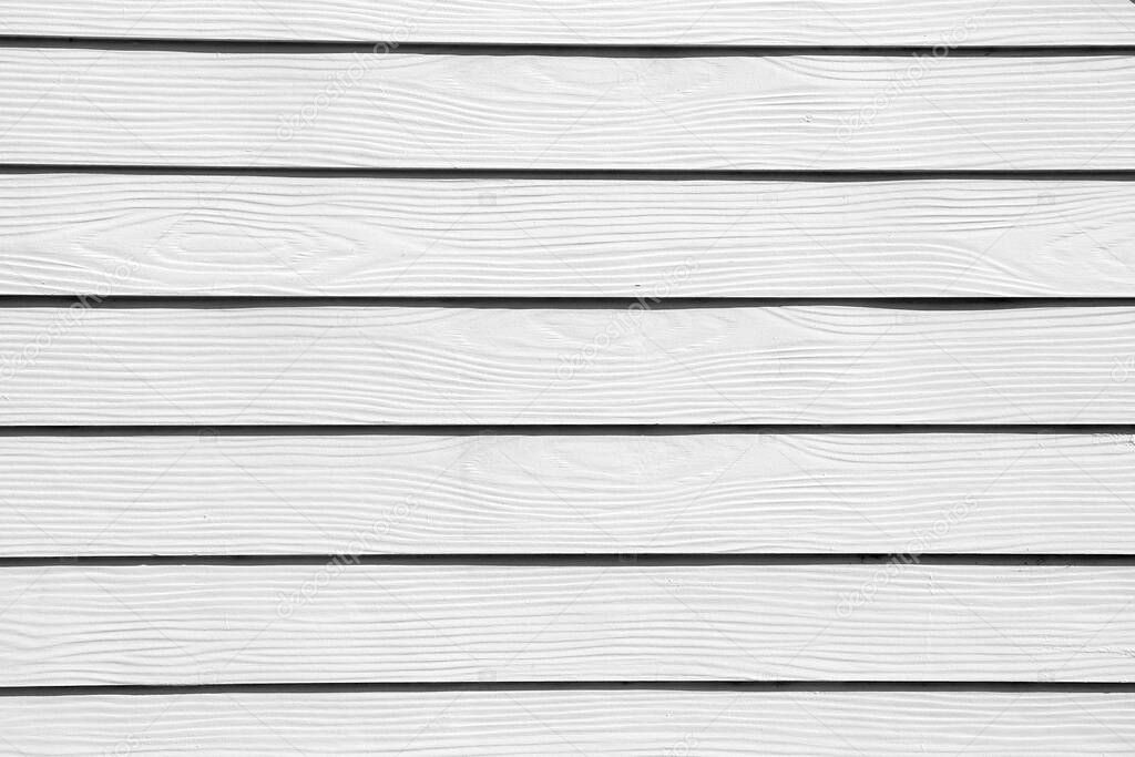Light white painted wood grungy pine plank fence, white wall background, wood grain