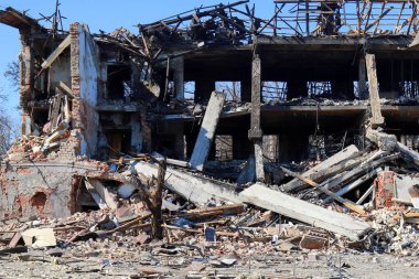 Ruined house Ukraine. Destroyed and burnt civilian building after rocket attack of Russian in Ukrainian city Dnipro. Russia war in Ukraine, shelling, destruction of houses. March 2022 clipart