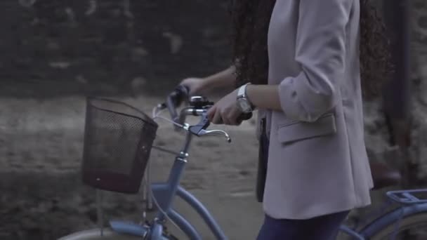 Cropped Image Curly Haired Female Wearing Casual Clothes Walking Bicycle — Video