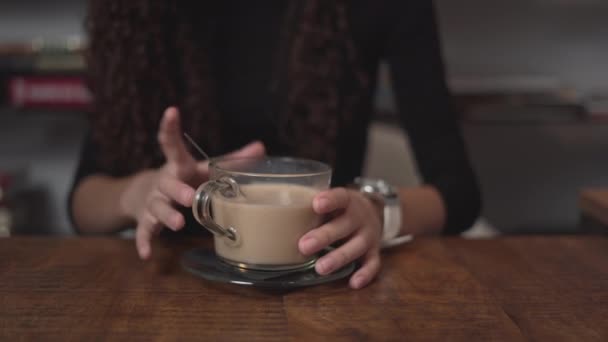 Girl Stirring Hot Coffee Wooden Table Smelled Close Horizontal — Stockvideo