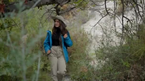 Lone Young Dark Haired Explorer Woman Walks Forest Close Pan — Vídeos de Stock