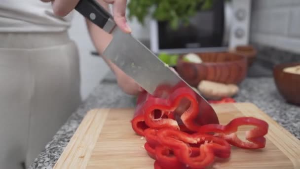 Girl Slicing Red Bell Pepper Chopping Board Close Horizontal — Video Stock
