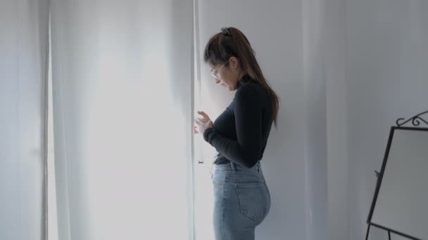 Young Teenage Girl Standing Front Window Checking Her Smiling Student — Video Stock