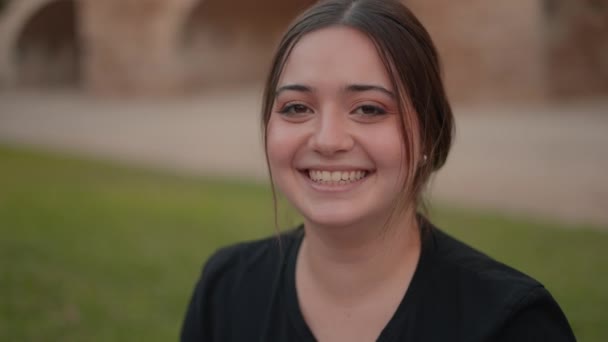 Closeup Positive Girl Brown Tied Hair Expressing Happiness Face Laughing — Stockvideo