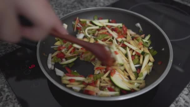 Person Stirring Chopped Mix Veggies Cook Pan Electric Burner High — Video Stock