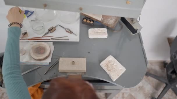 Woman Jeweler Working Table Work Tools Workshop Overhead Shot Horizontal — Stockvideo