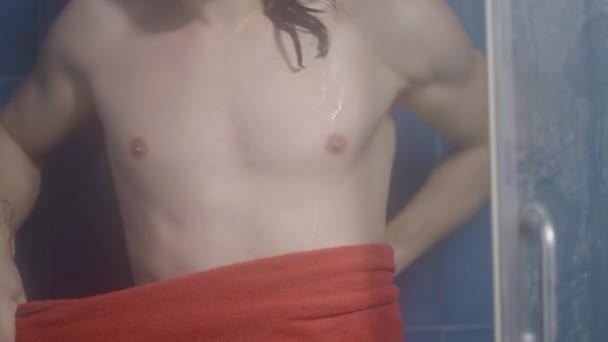 Fit Caucasian Young Man Putting Towel Shower Close Shot Horizontal — стоковое видео