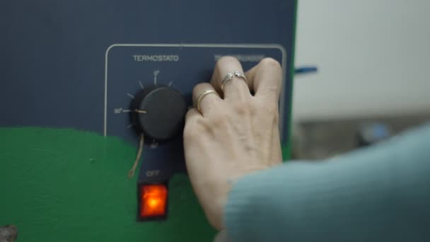 Female Hand Adjusting Temperature Knob Jewelry Making Equipment Workshop Close – Stock-video