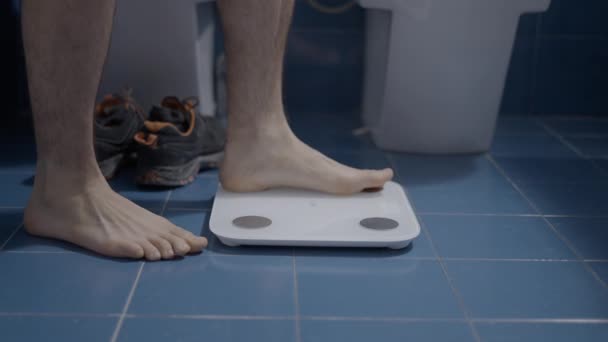 Barefoot Man Weighting Himself Bathroom Morning Routine Close Shot Horizontal — Video Stock